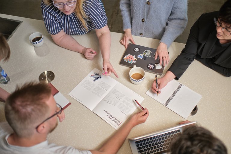 Tuxera team planning around a table